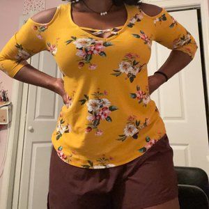 Long sleeve floral top with open shoulders and crisscross front